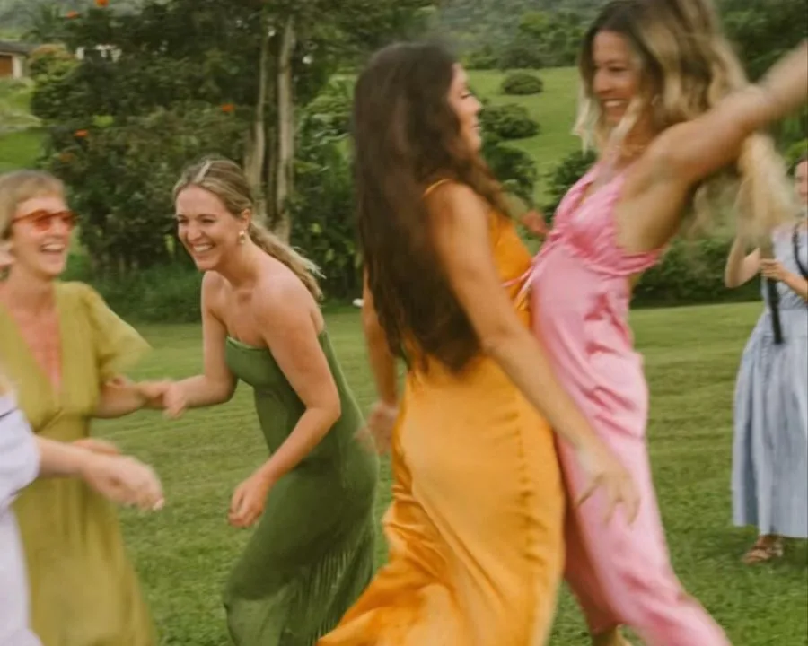 Guests crossing a lawn at a garden celebration