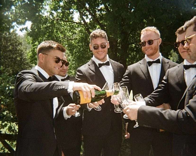 Guests raising a toast at a wedding